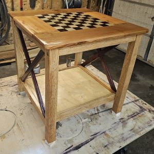 a picture of a large table with an inlaid chess board