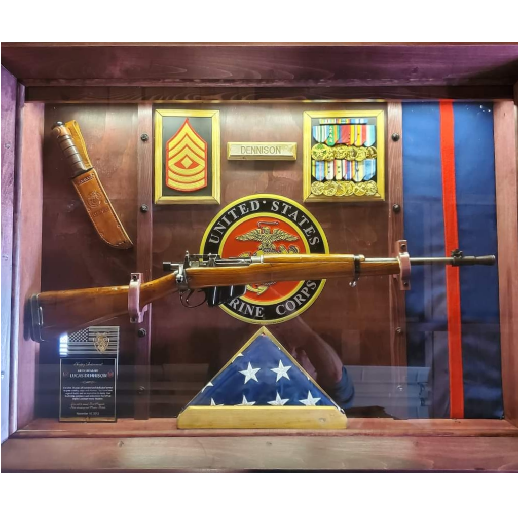 a picture of a lit shadow box with military memorabilia